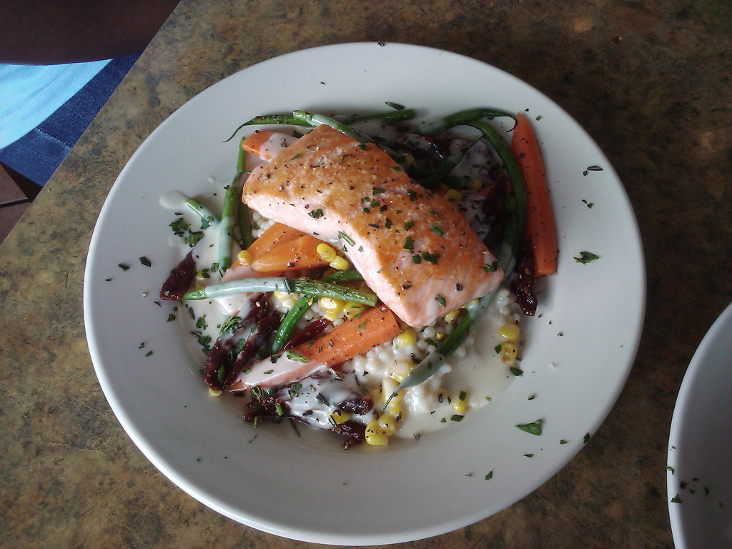 Atlantic Salmon over couscous with local veggies