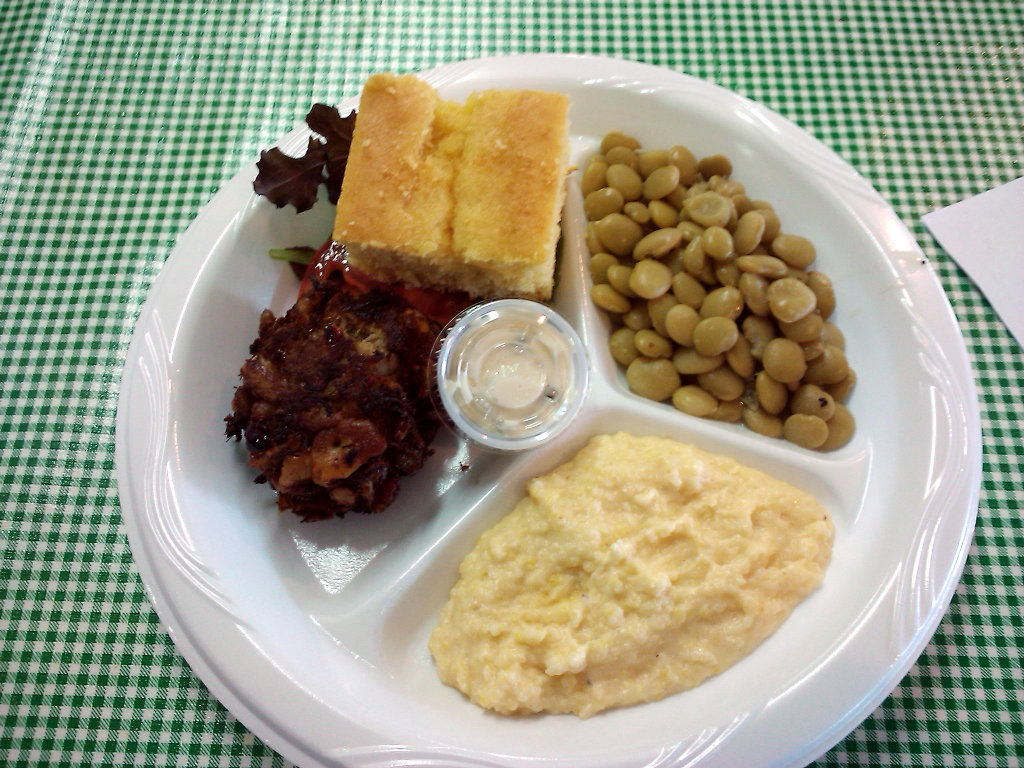 Crab cake platter with green butter beans and cheesy stone ground grits from the Tomato Shed Cafe