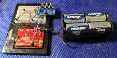 A battery pack of 8 C-cells connected to a Sparkfun RedBoard