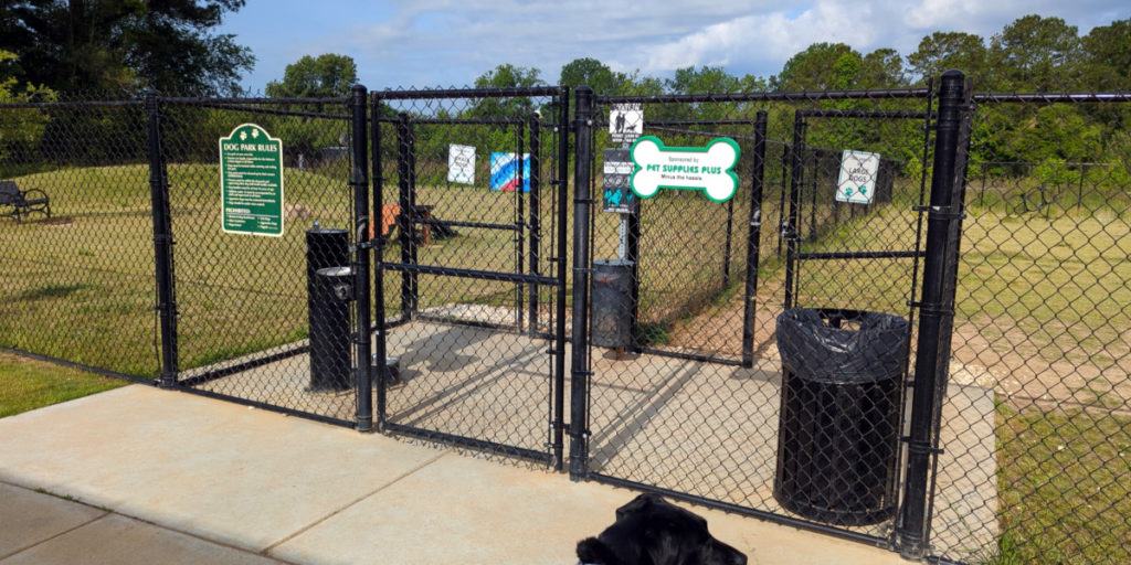 Dog lock entry gates. Inside the front gate are two entry gates for a large dog area and a small dog area.